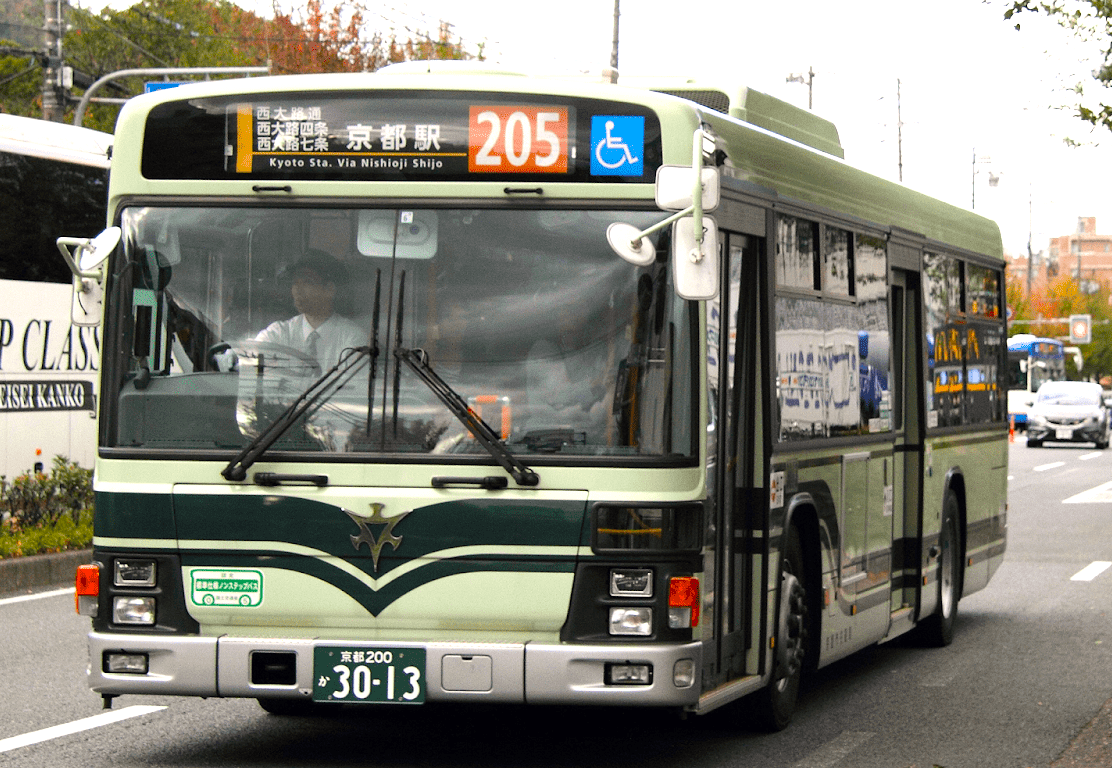 Second bus, with a green and cream livery